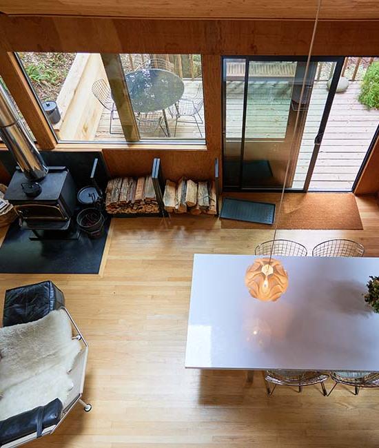 Redwood Rise Overview of Dining, Fireplace, & Deck